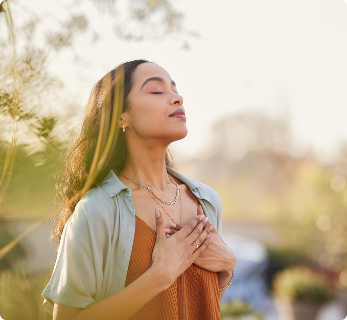 a woman enjoying the sunlight